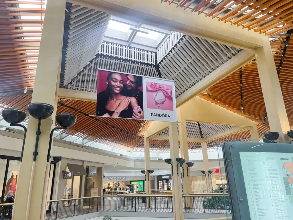 View of the mall roof containing a Pandora banner flag.